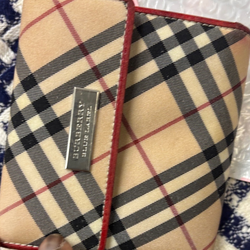 Burberry Red Leather Wallet - with some wears but in excellent condition.